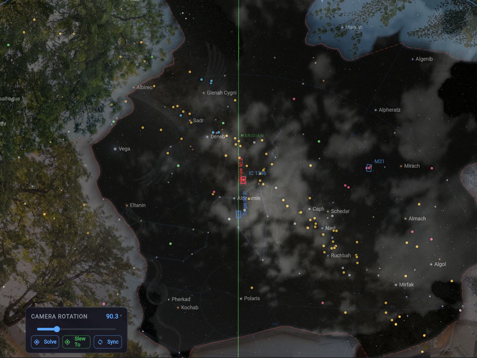 ARIS Plan view with the live cloud layer on — tonight's clouds from the all-sky camera drawn over the star map, and the automatically captured horizon masking the trees and roofline